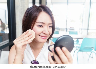 Make Up Woman Holding Powder Puff