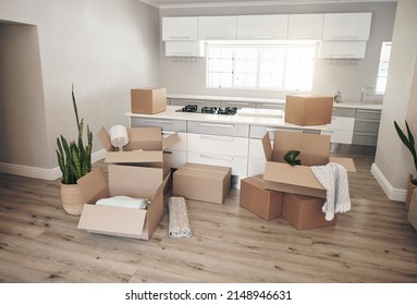 Make It Your Own. Shot Of A Room Full Of Boxes Waiting To Be Unpacked On Moving Day.