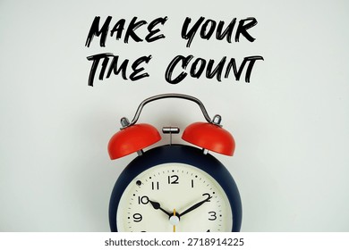 Make Your Time Count text with alarm clock flat lay on white background