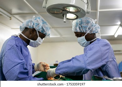 Makeni, Sierra Leone - June 22, 2019: African doctors surgeons operating on a patient in hospital