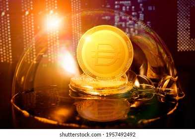 MakerDAO DAI bubble. MakerDAO DAI coin in a soap bubble. Dangers and risks of investing to DAI cryptocurrency. Speculation, drop, down - Shutterstock ID 1957492492