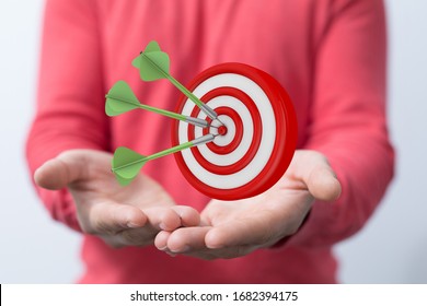  makes a dart throw on the target. The concept of persistence in business. - Shutterstock ID 1682394175