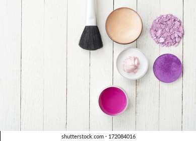 Makeup Accessories On White Wooden 