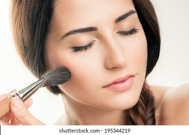 Makeup Applying  closeup. Cosmetic Powder Brush. Perfect Skin
