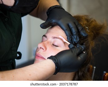 Makeup Artist Does Facial Hair Removal Procedure Melted Wax For Facial Hair Removal.