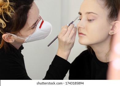 Makeup Artist Wearing A Medical Mask