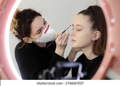 Makeup Artist Wearing A Medical Mask.