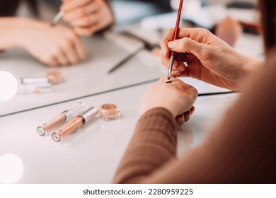 Makeup artists at work in the process.