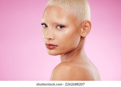 Makeup, beautiful and portrait of a woman with cosmetics isolated on a pink background in studio. Beauty, retro and face of a cool vintage model with edgy, stylish and classy glamour on a backdrop