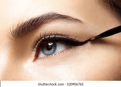 Make-up with black eyeliner close-up