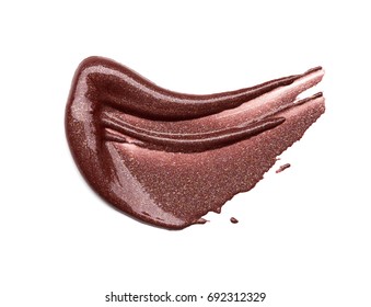 Makeup Bronze Smear Of Lip Gloss Isolated On White Background. Texture Of Lip Gloss On White