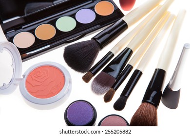 makeup brush and cosmetics, on a white background isolated - Shutterstock ID 255205882
