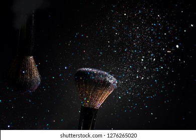 Makeup brush with glitter dust