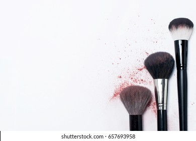 Makeup brush with the remnants of the blush and powder