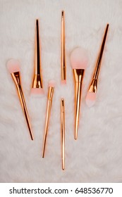 makeup brush set isolated on a white fur background