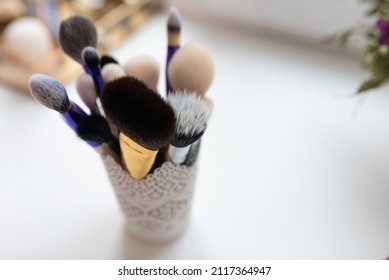 Makeup brushes, different sizes, in a glass. High quality photo
