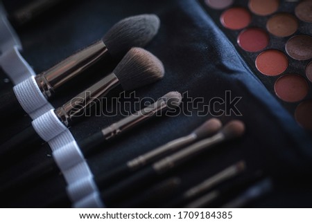 makeup brushes and eye shadow