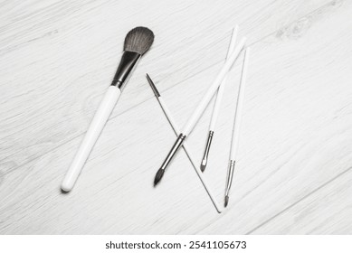 Make-up brushes isolated over white background. Professional makeup brushes. Natural and synthetic bristles, black handles and elegant looking make up artist tools. - Powered by Shutterstock