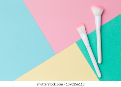 Makeup Brushes On A Colorful Background. Color Block Background With Empty Space