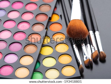 Makeup brushes and shadows
