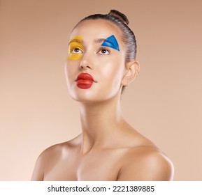 Makeup, Clown And Young Woman With Facial Art, Natural Beauty And Wellness With Brown Studio Background. Artist, Female And Girl Being Creative, With Pride And Confident With Cosmetics Or Face Paint.