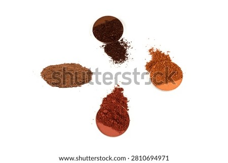 Makeup cosmetics. Eyeshadow crushed palette, colorful eye shadow powder isolated on a white background.