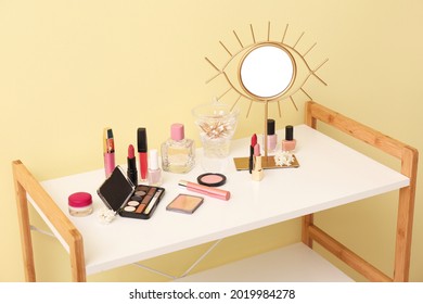 Makeup cosmetics on table in dressing room