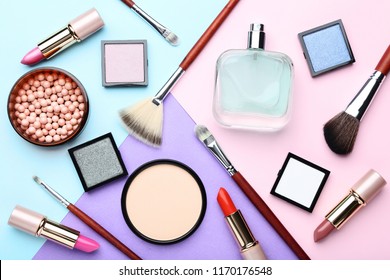 Makeup Cosmetics With Perfume Bottle On Colorful Background