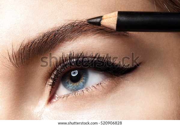 Makeup eyebrow pencil.\
Close-up photo.