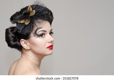 make-up, hairstyle and red lips. Beautiful woman model with makeup and romantic look. Portrait of beautiful brunette woman.  Retro portrait of a beautiful woman. Vintage style. Fashion photo 
