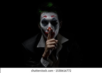 Makeup for Halloween: Image of a man in a joker makeup - Shutterstock ID 1530616772