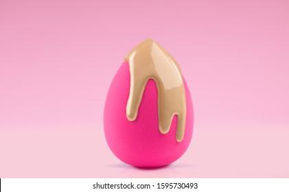 Makeup liquid foundation pouring on make-up blender sponge, closeup. Applying Foundation beauty facial cosmetics, tool for perfect make up. Dripping bb cream or concealer, over pink background