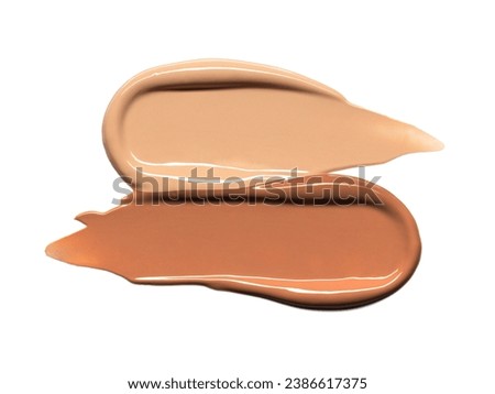 Makeup Liquid foundation smear composition isolated on white background. BB CC Cream Concealer texture. Cosmetic product brush swatch