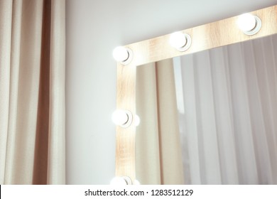 Makeup Mirror Near White Wall In Dressing Room. Space For Text