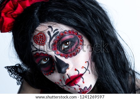 Make-up model with theme Mexican Day of the Dead in a study session in madrid, spain