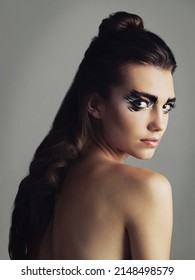 Makeup Is My Spirit Animal. Studio Shot Of An Attractive Young Woman Wearing Bold Eye Makeup.