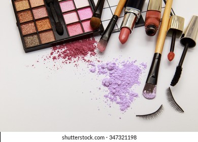 makeup products on white background