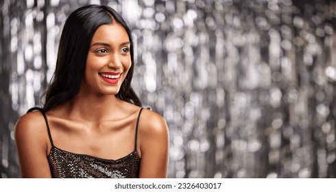 Makeup, smile and Indian woman in studio with glamour, cosmetics and glowing skin on blurred background. Face, beauty and happy female with luxury aesthetic, sparkle and cosmetology satisfaction