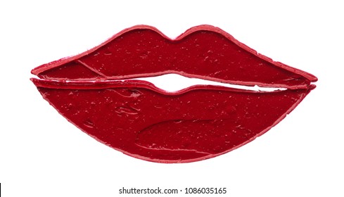 Makeup stencil of red matte lip gloss isolated on white background. Red creamy lipstick texture in the shape of red lips on white background