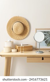 Makeup table with mirror, perfume and accessories in room