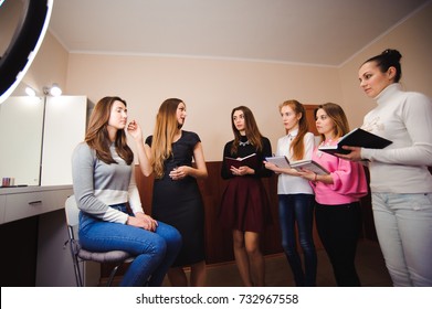 Makeup Teacher With Her Student Girls. Makeup Tutorial Lesson At Beauty School. Makeup Master Class