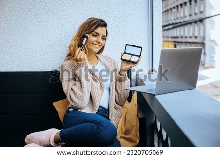 makeup tutorial by young woman online influencer