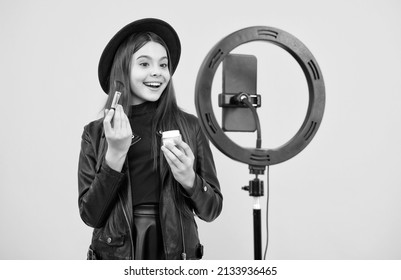 makeup tutorial. influencer. teen girl use selfie led. kid beauty blogger. cheerful child do makeup