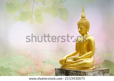 Makha Asanaha Visakha Bucha Day Golden Buddha image. Background of Bodhi leaves with shining light. Soft image and smooth focus style