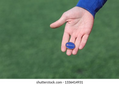 Makhachkala, Russia - March 9, 2019:  Football Referee Equipment, UEFA Blue Coin Toss.