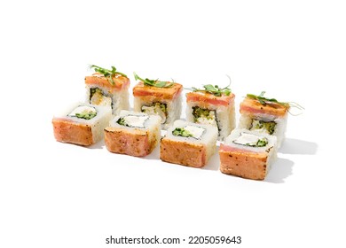 Maki Sushi With Baked Salmon Outside, Shrimp, Cucumber And Cheese Inside Topped Micro Greens. Grilled Salmon And Shrimp Maki Roll Isolated On White Background. Trendy Sushi Roll With Burnt Tuna Fish