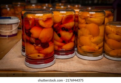 Making of apricot compote on wooden table interior middle of summer with male - Shutterstock ID 2176944375