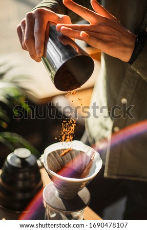 Similar – Senior Paar Hände gießen Kaffee aus der Thermoskanne.