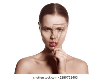 Making beauty, modifying face to make non-surgical or surgical correction, plastic surgery. correction of asymmetry. Young woman, female patient isolated on white studio background. Concept of lifting
