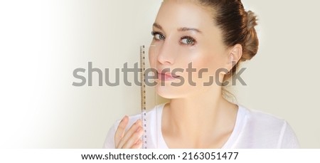 Making Beauty, modifying face to make it closer to the Golden Mask,plastic surgery. correction of asymmetry.